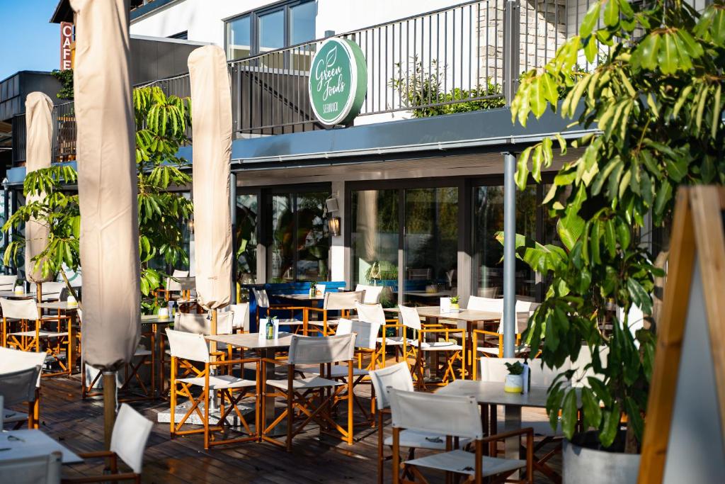Restaurace v ubytování QC Hotel Quartier Chiemsee
