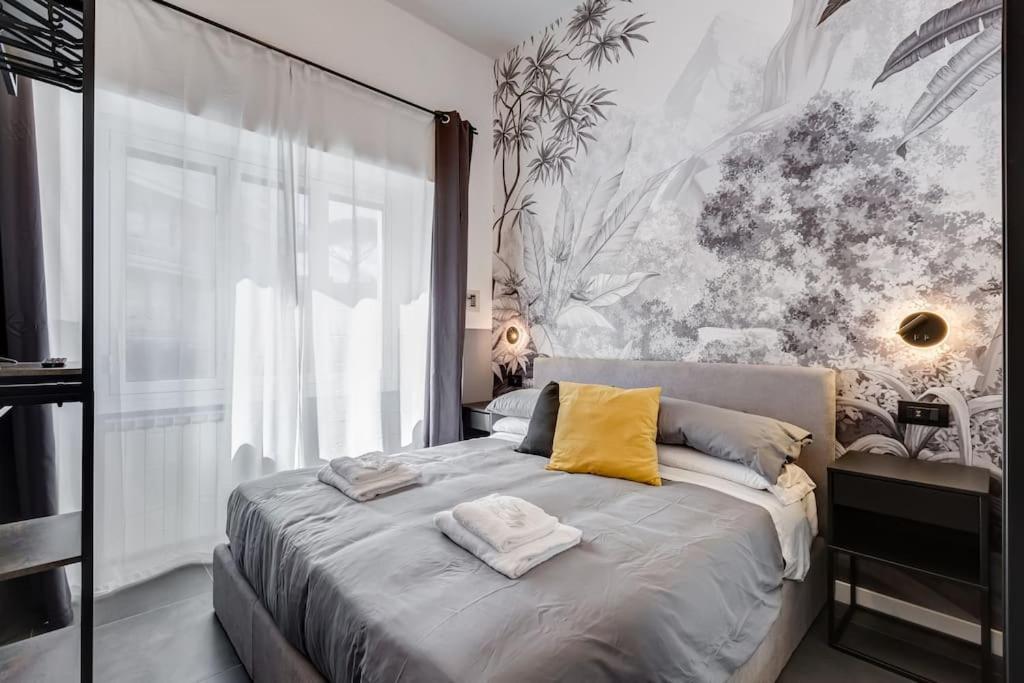 A bed or beds in a room at Classy Apt in the richest Rome