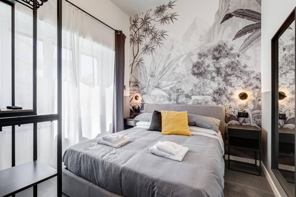 A bed or beds in a room at Classy Apt in the richest Rome