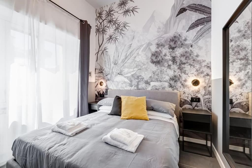 A bed or beds in a room at Classy Apt in the richest Rome