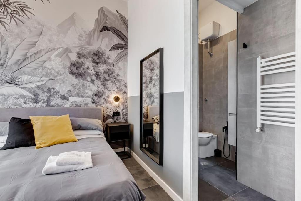 A bed or beds in a room at Classy Apt in the richest Rome