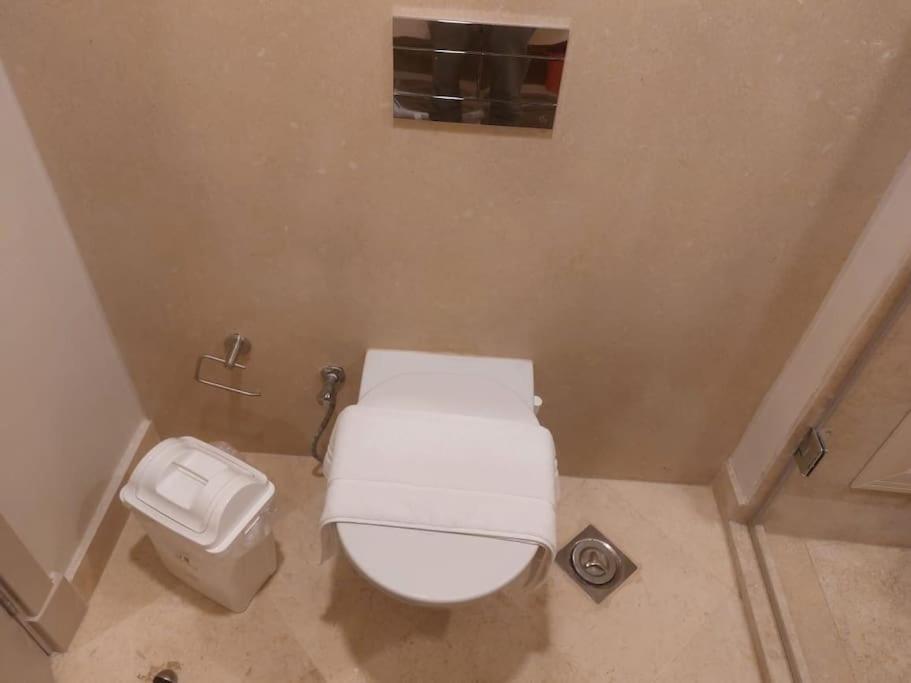A bathroom at Mangroovy - 2BR La Blanca Pool View