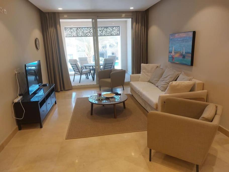 A seating area at Mangroovy - 2BR La Blanca Pool View