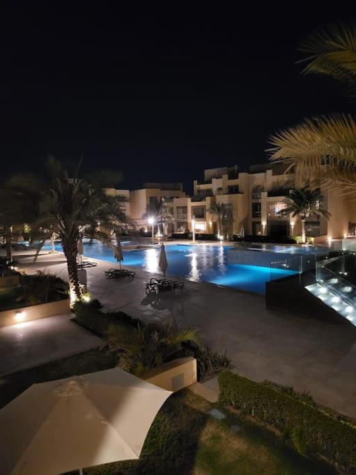 The swimming pool at or close to Mangroovy - 2BR La Blanca Pool View