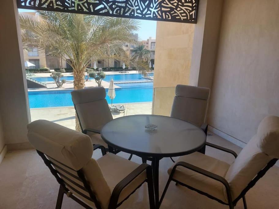 The swimming pool at or close to Mangroovy - 2BR La Blanca Pool View