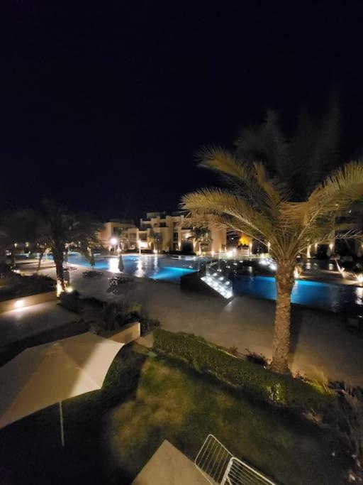 The swimming pool at or close to Mangroovy - 2BR La Blanca Pool View