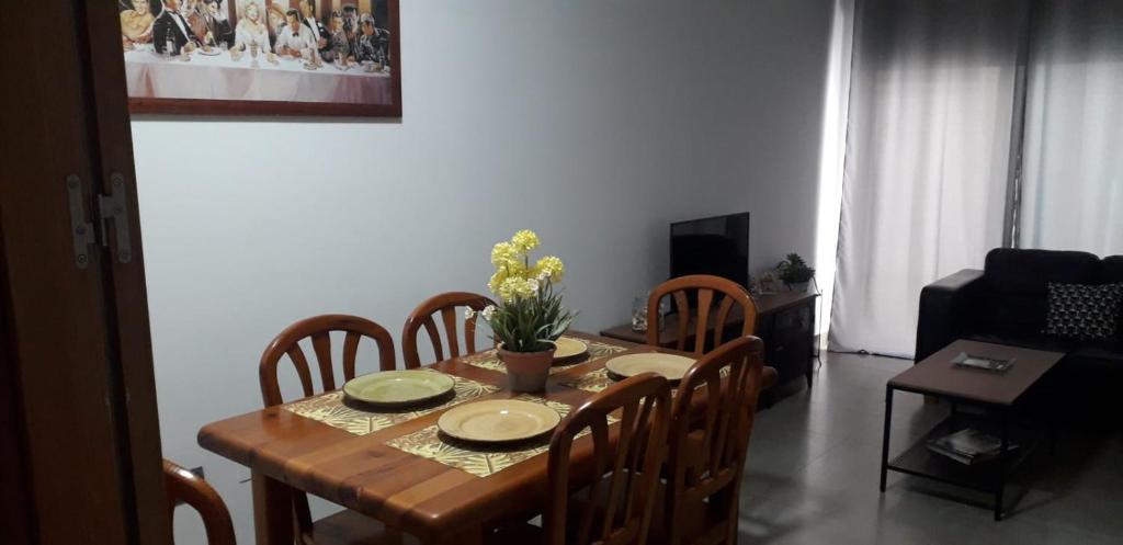 a dining room table with chairs and a table and a table and chairsktop at Centro in Málaga