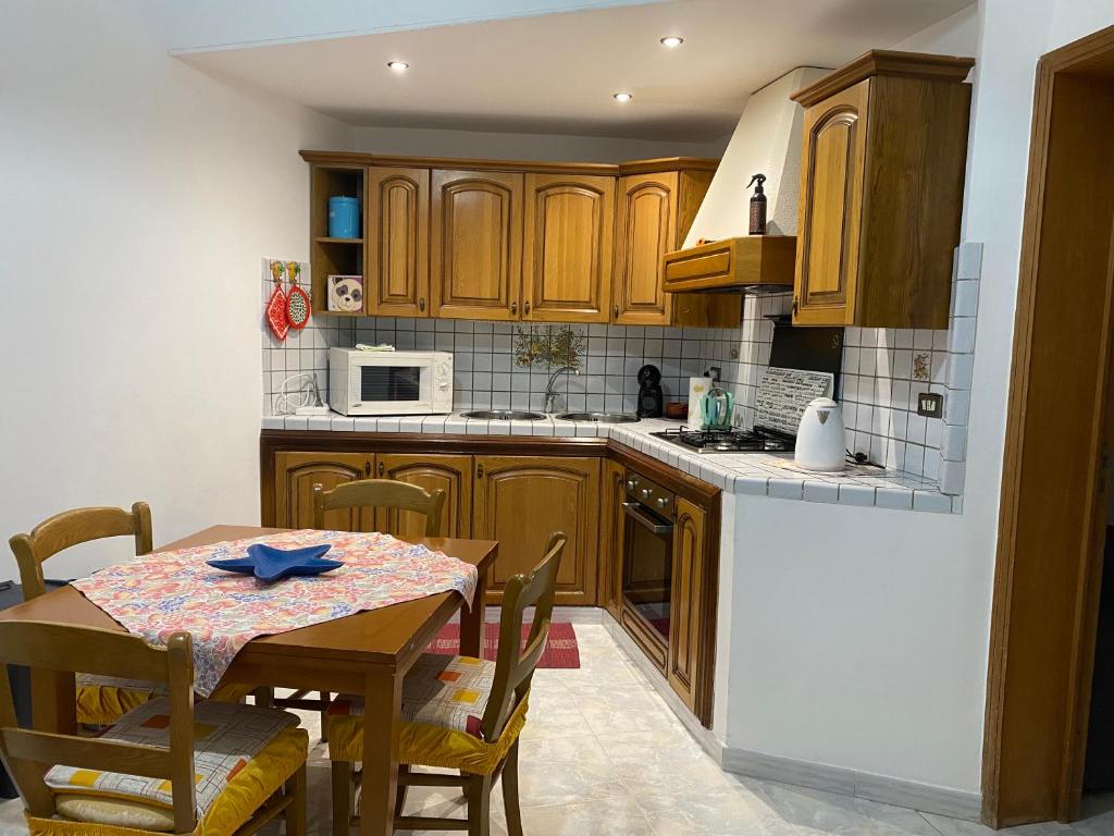 A kitchen or kitchenette at Casa vacanza da Paola