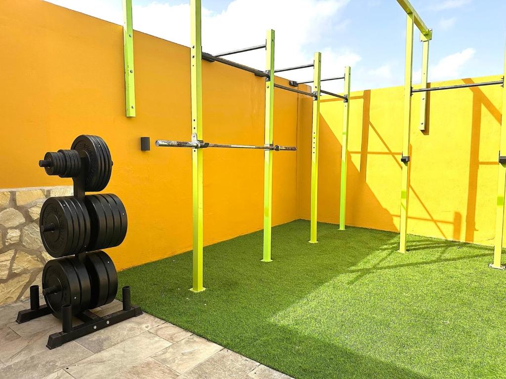 The fitness centre and/or fitness facilities at Cloud Tropical - Piscina climatizada - Gym Privado