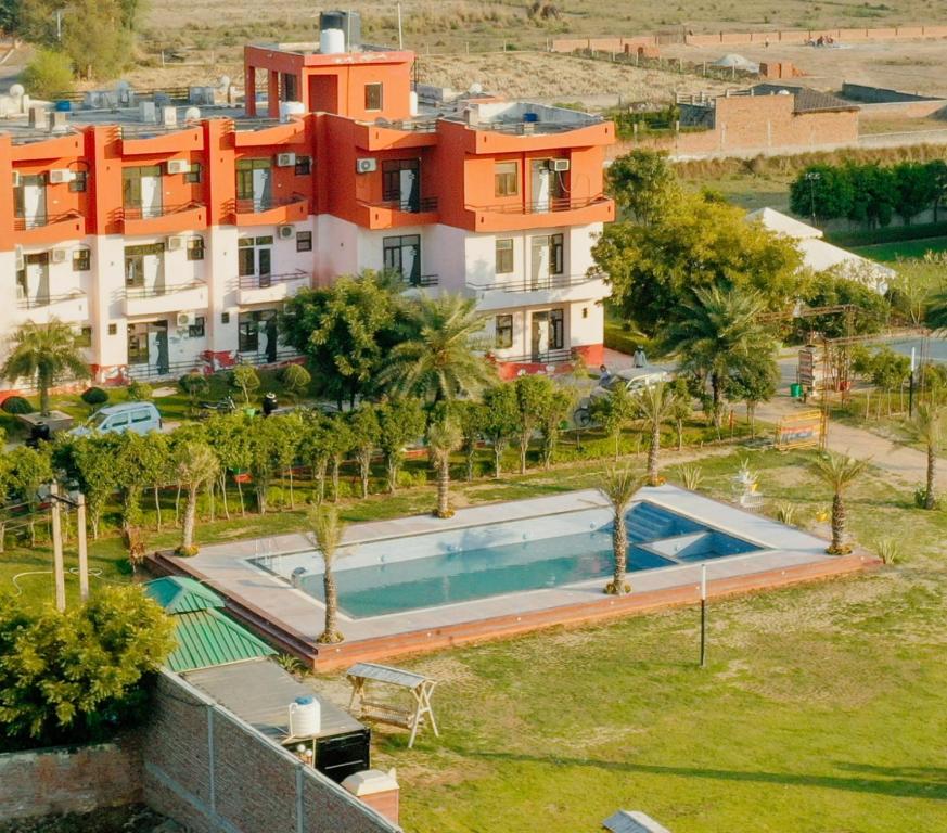 an aerial view of a house with a swimming pool at Elegance Resort in Jait