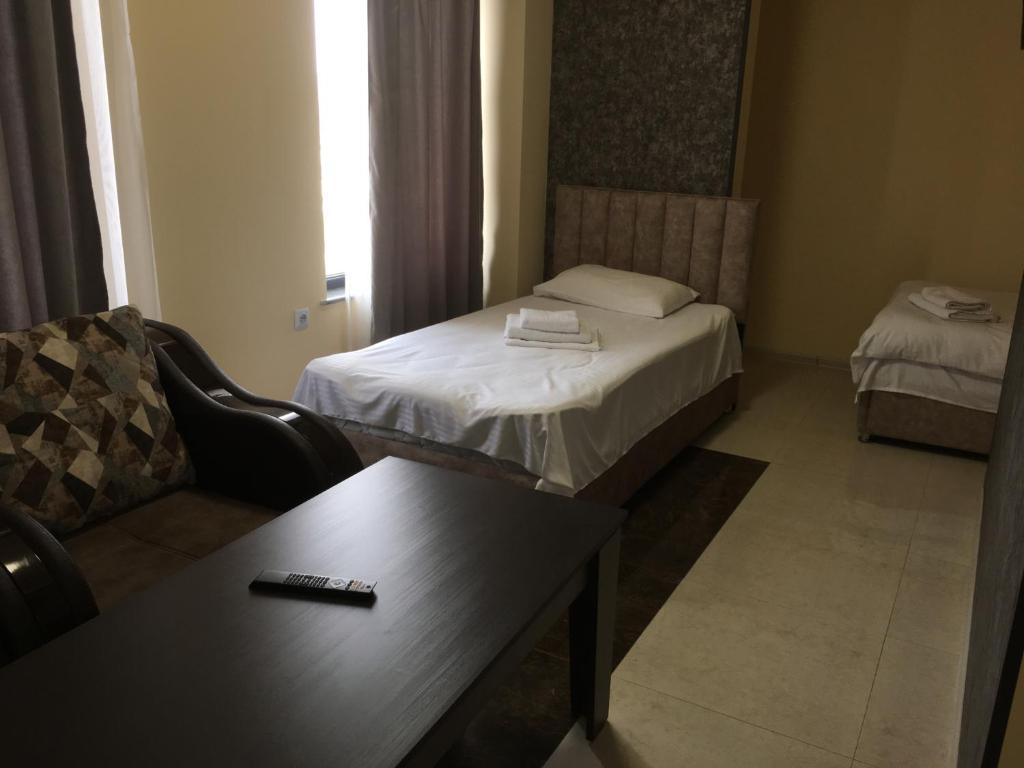 Postel nebo postele na pokoji v ubytování RP HOTEL (NEW)