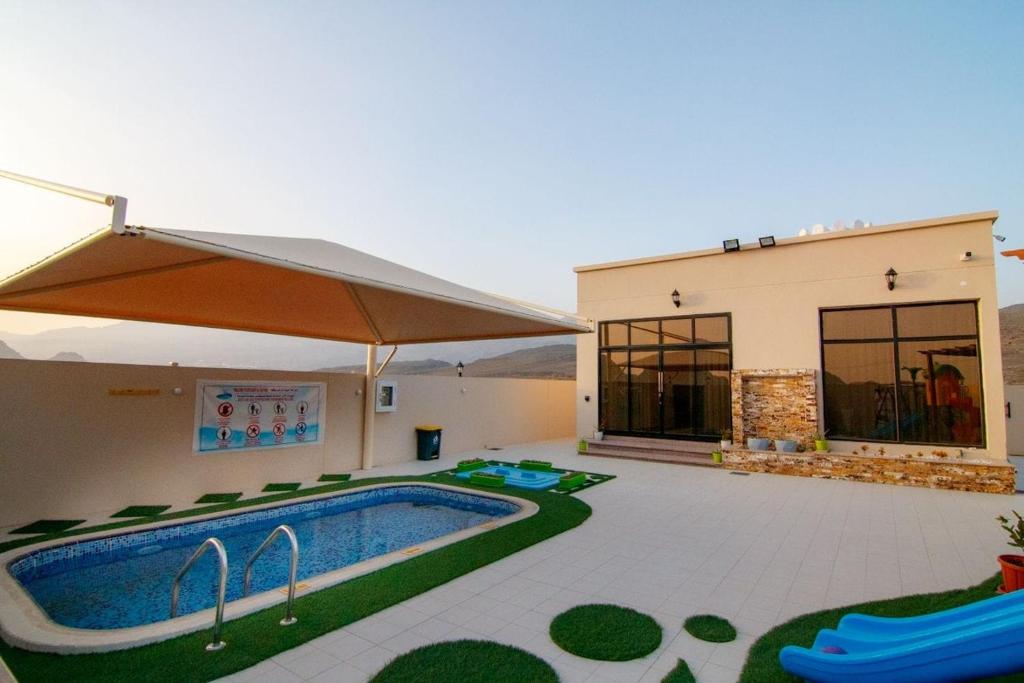 Swimming pool sa o malapit sa Estrahet Al Haitham