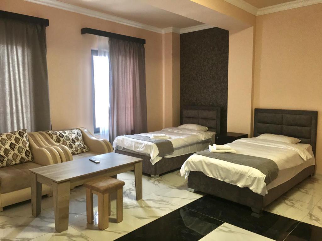 Postel nebo postele na pokoji v ubytování RP HOTEL (NEW)