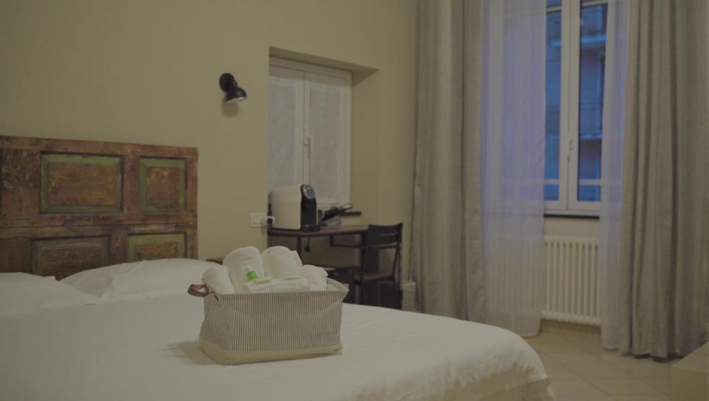 Postel nebo postele na pokoji v ubytování Piccolo Borgo