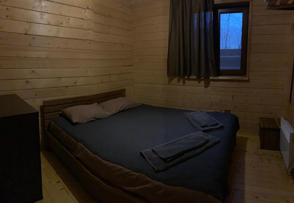 Postel nebo postele na pokoji v ubytování Guest House Pid Dubom Карпати Під Дубом