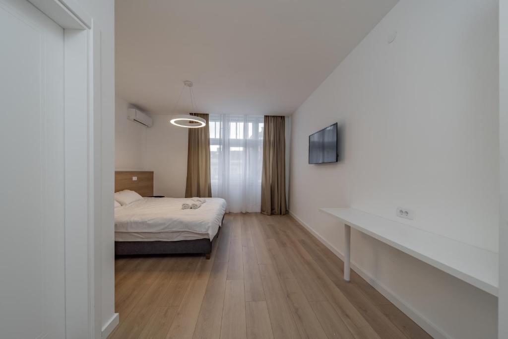 Voodi või voodid majutusasutuse BG Exclusive Suites toas