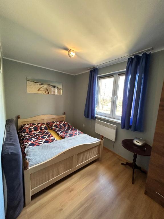 Postel nebo postele na pokoji v ubytování Hacjenda