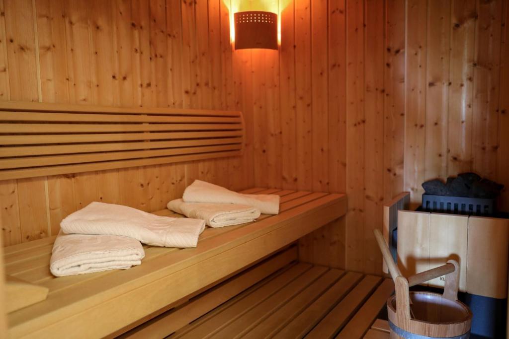 Postel nebo postele na pokoji v ubytování Schwarzwald Chalets