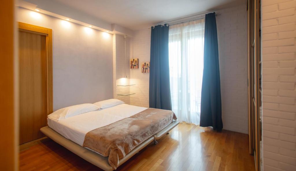 Posteľ alebo postele v izbe v ubytovaní Réva Residences and Pool