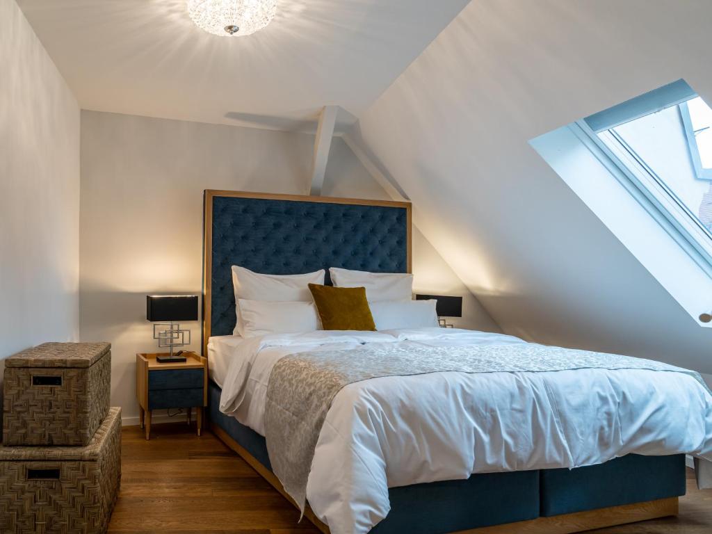 Postel nebo postele na pokoji v ubytování Suite Home Apartments