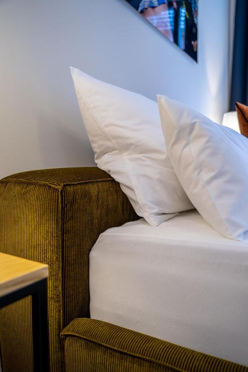Postel nebo postele na pokoji v ubytování Suite Home Apartments