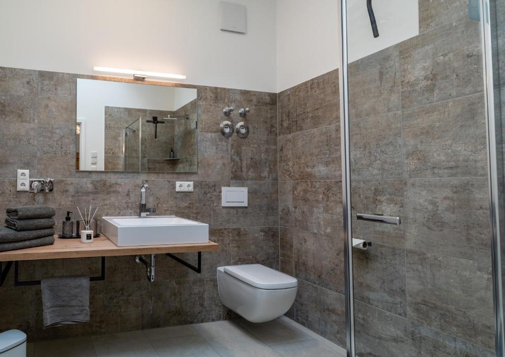 Koupelna v ubytování Suite Home Apartments