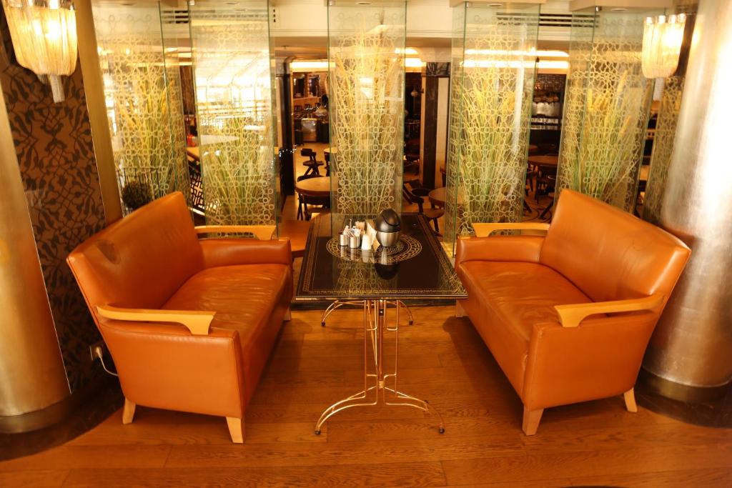 A seating area at Grand Star Hotel Premium