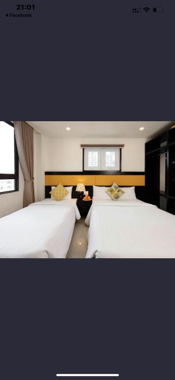 Postel nebo postele na pokoji v ubytování Tokia hotel nha trang