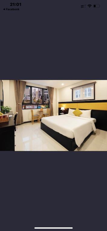 Giường trong phòng chung tại Tokia hotel nha trang