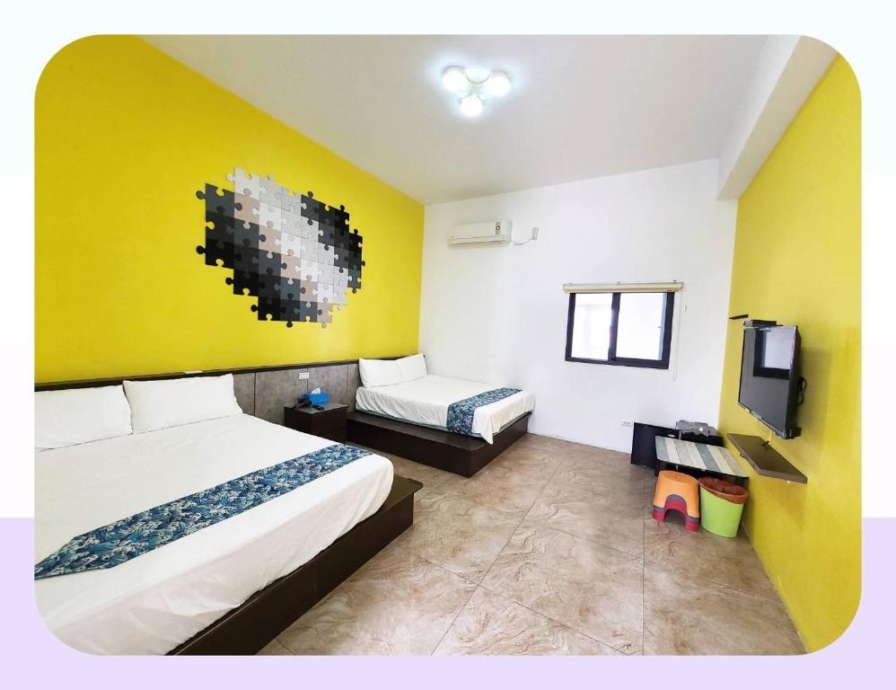 Postel nebo postele na pokoji v ubytování New Summer Homestay