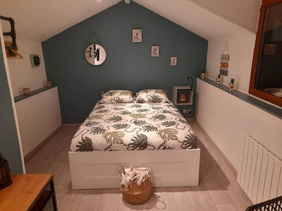 Posteľ alebo postele v izbe v ubytovaní Petit maison villageoise
