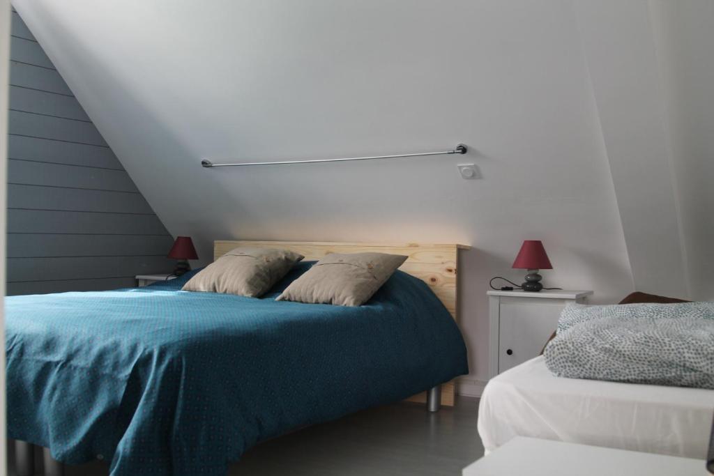 Postel nebo postele na pokoji v ubytování Maison Mama Neko