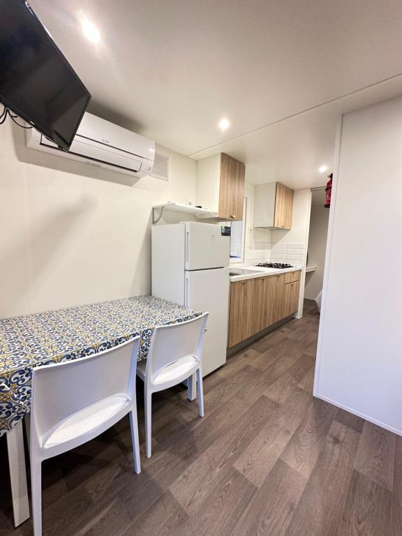 Kuchyň nebo kuchyňský kout v ubytování Camping Village La Sorgente