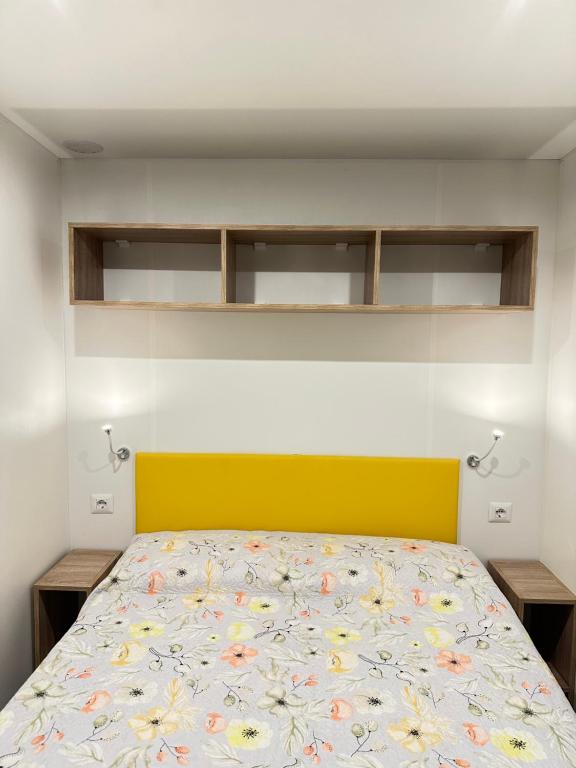 Postel nebo postele na pokoji v ubytování Camping Village La Sorgente