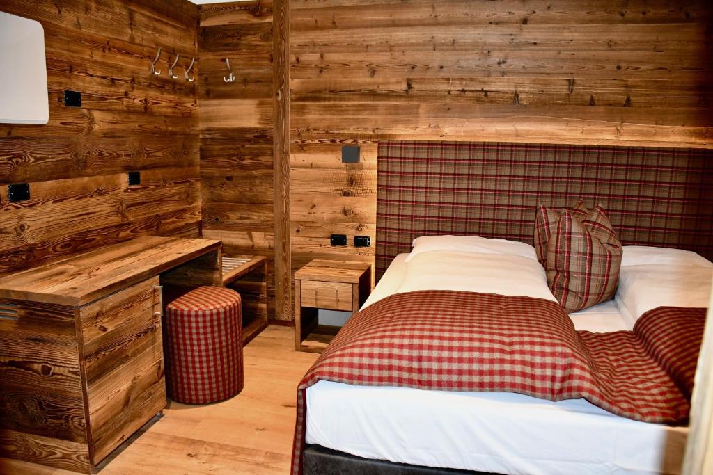 Postel nebo postele na pokoji v ubytování Hotel Alpenrose Wellness