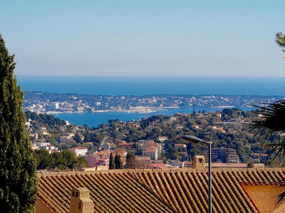 a view of a city and a body of water at Beautiful Sea View House in Vallauris