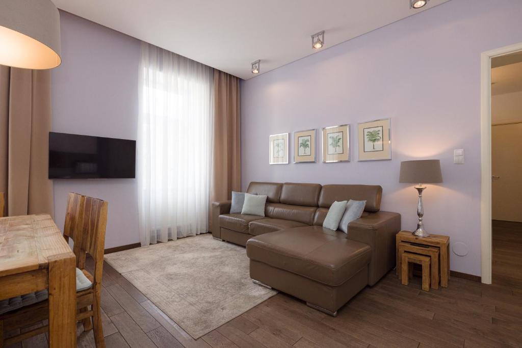 Televízia a/alebo spoločenská miestnosť v ubytovaní Rafael Kaiser Premium Apartments - Contactless 24h Check-In