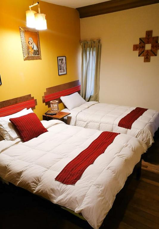 Postel nebo postele na pokoji v ubytování CASA HOSPEDAJE EL LABRADOR