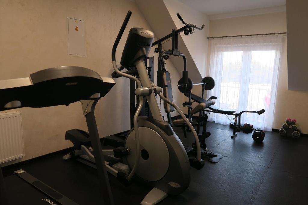 Posilňovňa alebo fitness centrum v ubytovaní Hotel Millenium