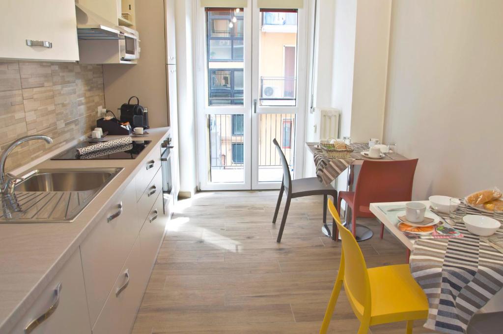 Kuchyň nebo kuchyňský kout v ubytování Minerva Rooms