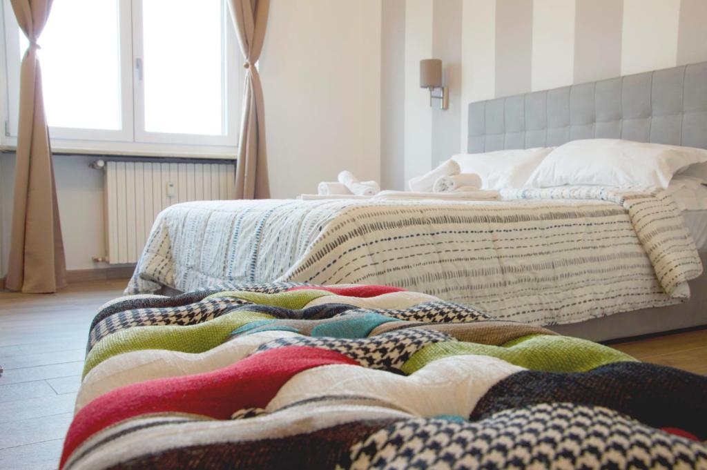 Postel nebo postele na pokoji v ubytování Minerva Rooms