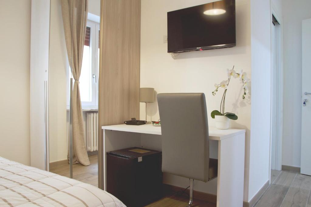 TV a/nebo společenská místnost v ubytování Minerva Rooms