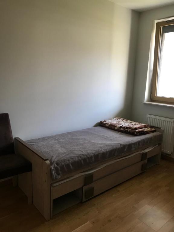 Posteľ alebo postele v izbe v ubytovaní Appartement Nowa Huta