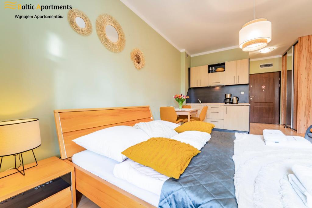 Postel nebo postele na pokoji v ubytování Baltic Apartments - Regina Maris