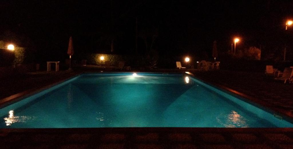 The swimming pool at or close to Hotel Il Caminetto