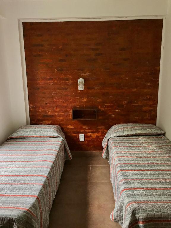 Postel nebo postele na pokoji v ubytování Bendito Alcázar Cabañas