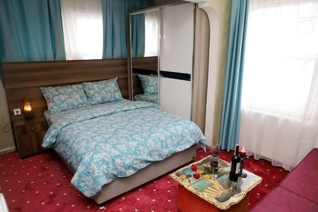 Postel nebo postele na pokoji v ubytování Afrodit Apart