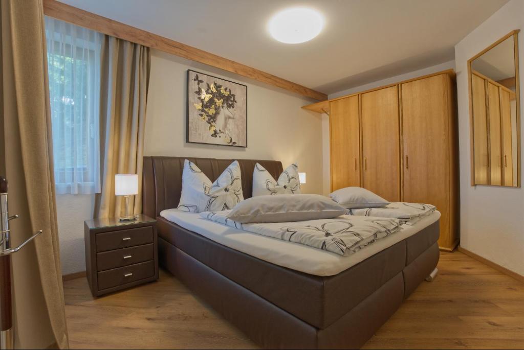 Postel nebo postele na pokoji v ubytování Ferienhaus Holzer