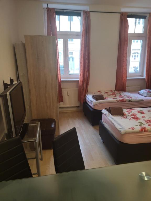 Postel nebo postele na pokoji v ubytování Apartmentzimmer
