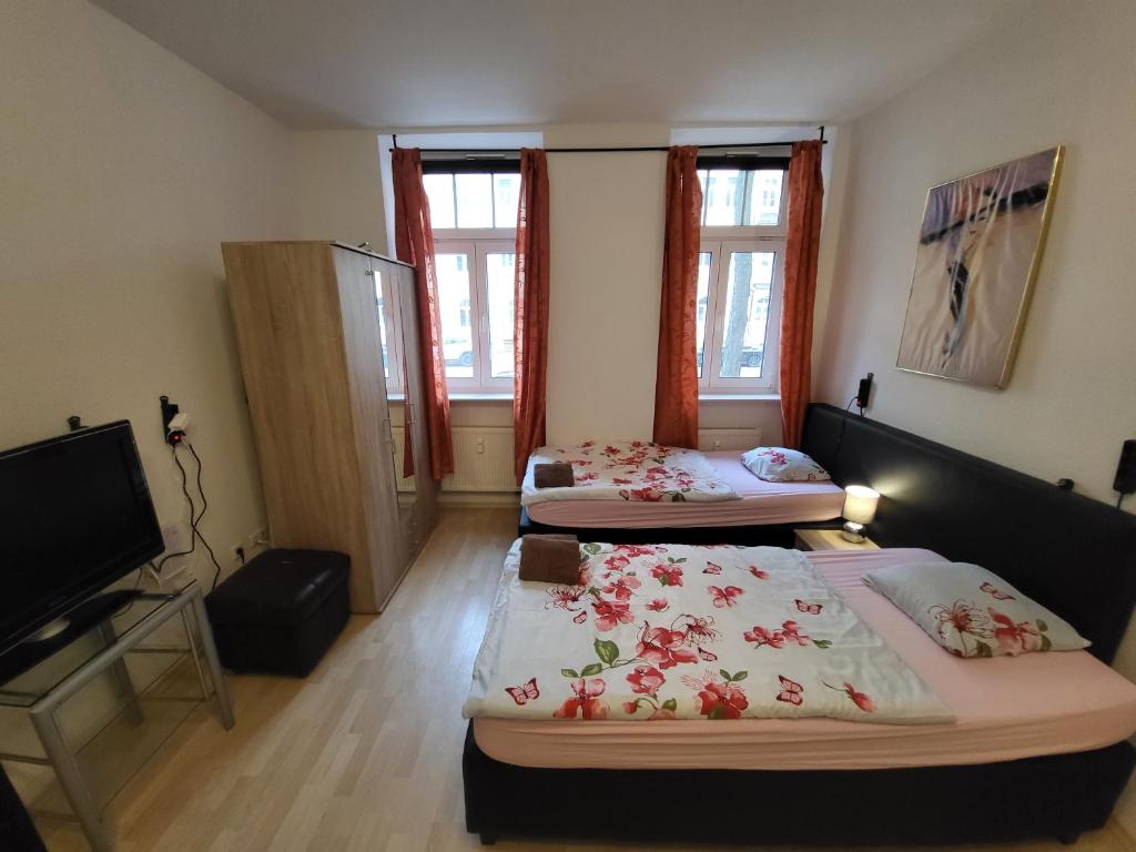 Postel nebo postele na pokoji v ubytování Apartmentzimmer